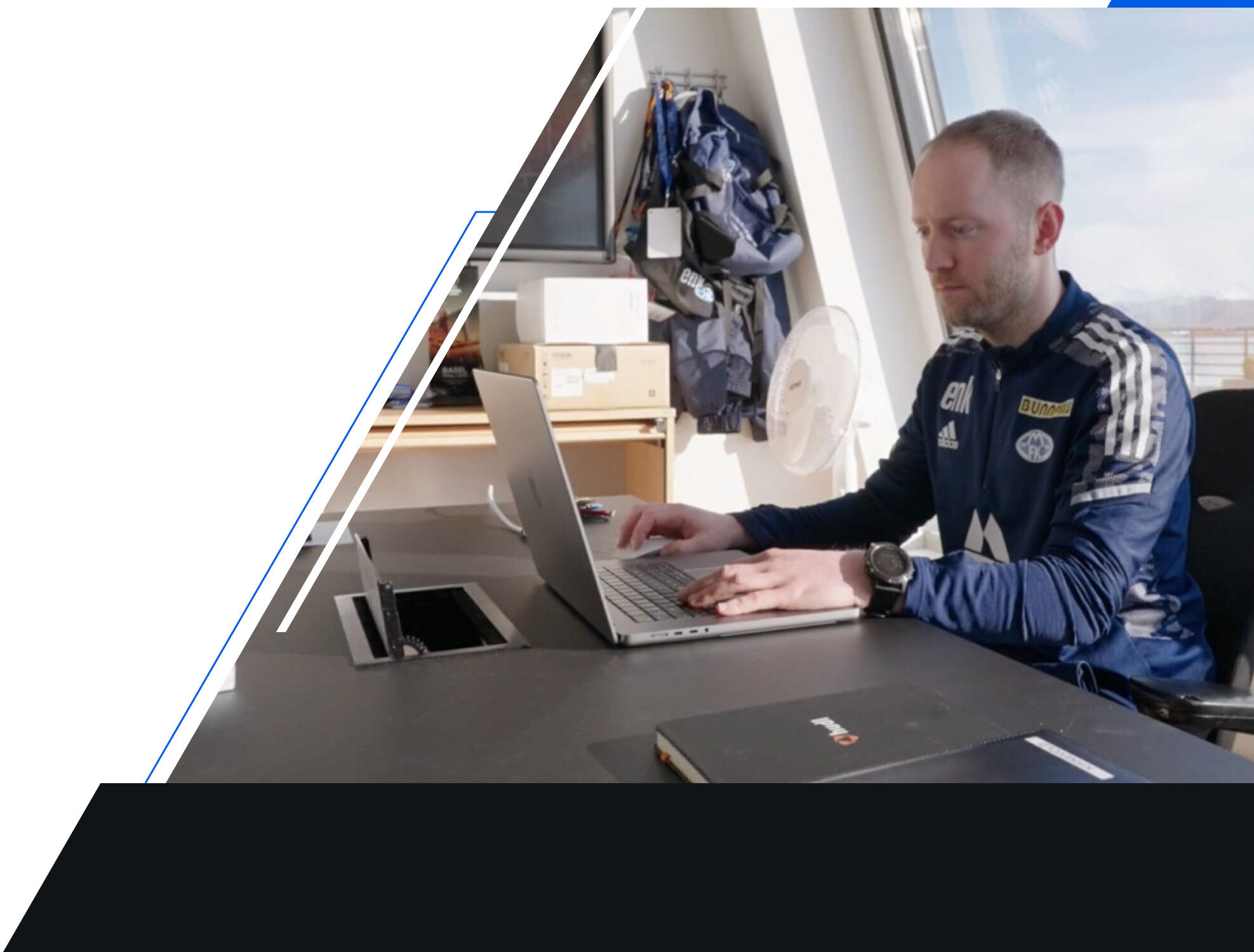 Video Analyst using Hudl Sportscode on a laptop computer